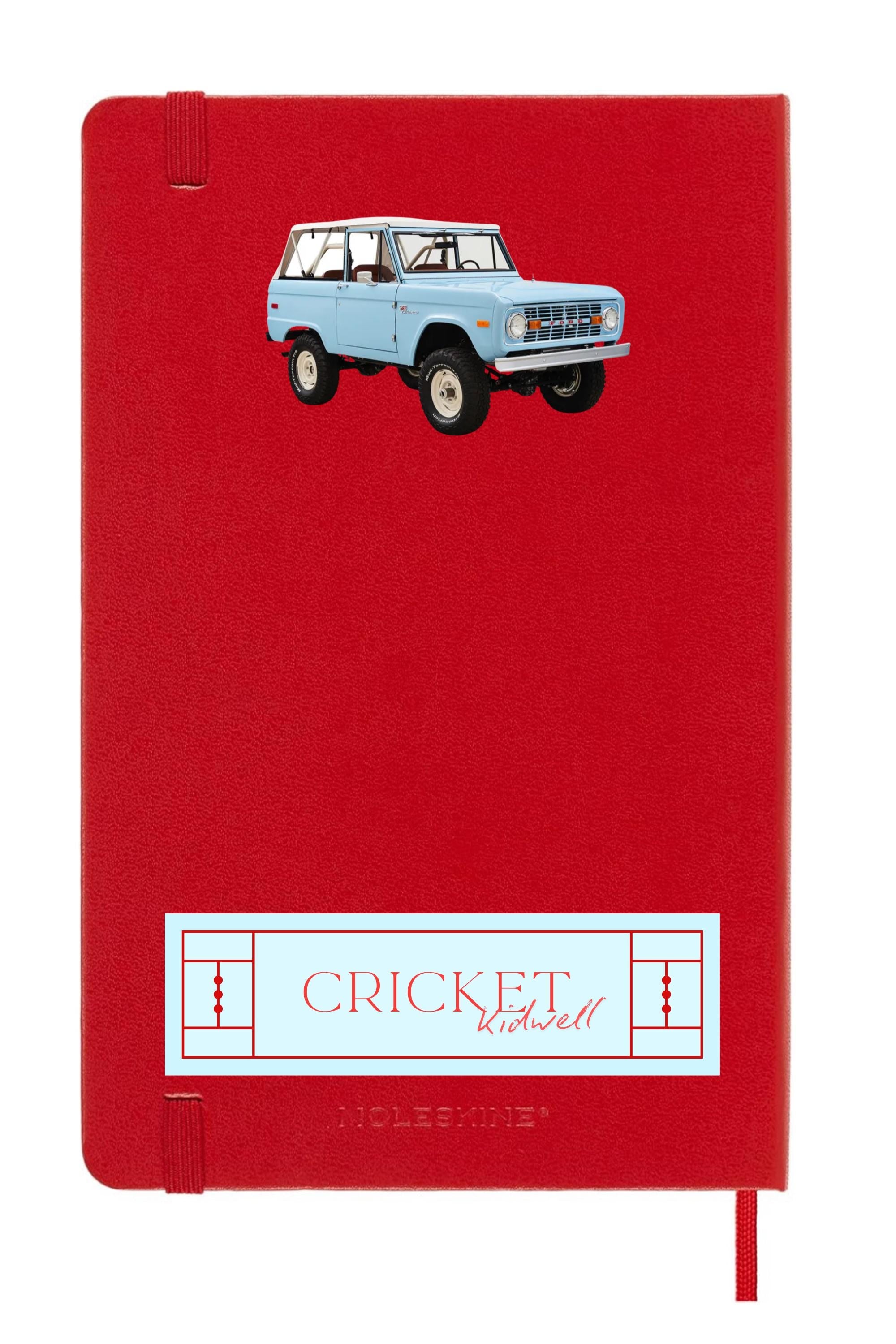 Red Moleskine journal featuring vintage Bronco art — a retro truck notebook ideal for car enthusiasts, travelers, and unique gift seekers.